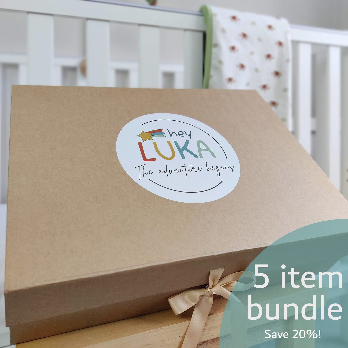 Gift wrapped box with Hey Luka logo and offer details of 5 item bundle with a 20% saving