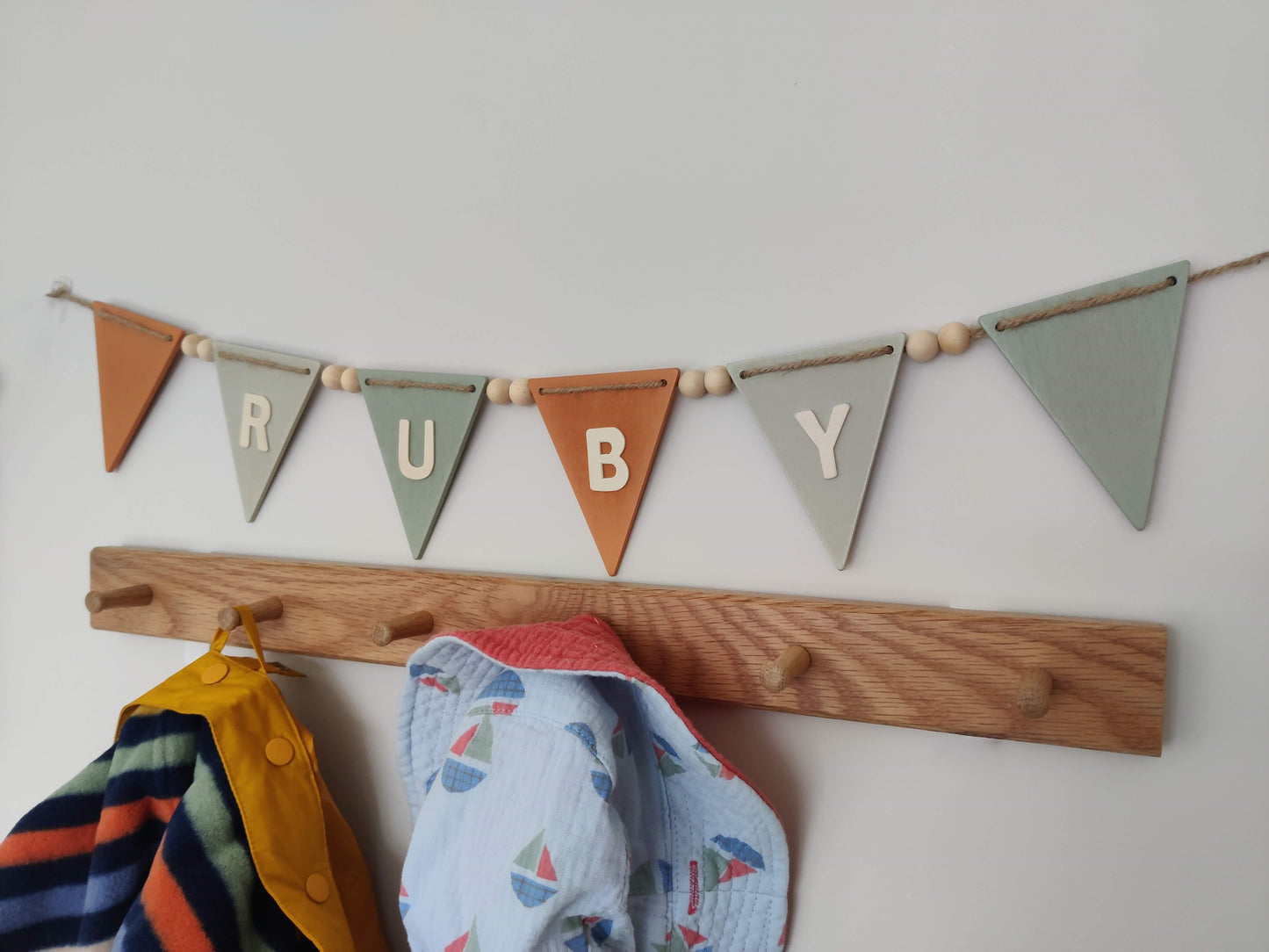 Safari coloured bunting with personalised name, wooden beads and natural twine